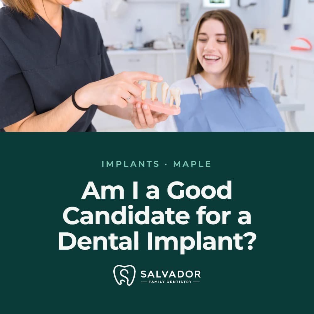 dentist showing a dental implant to his patient