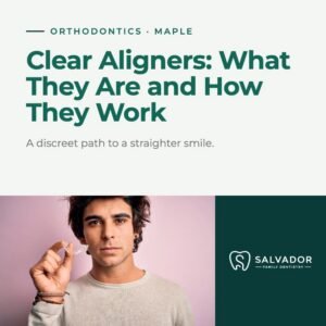 a man holding a clear aligners